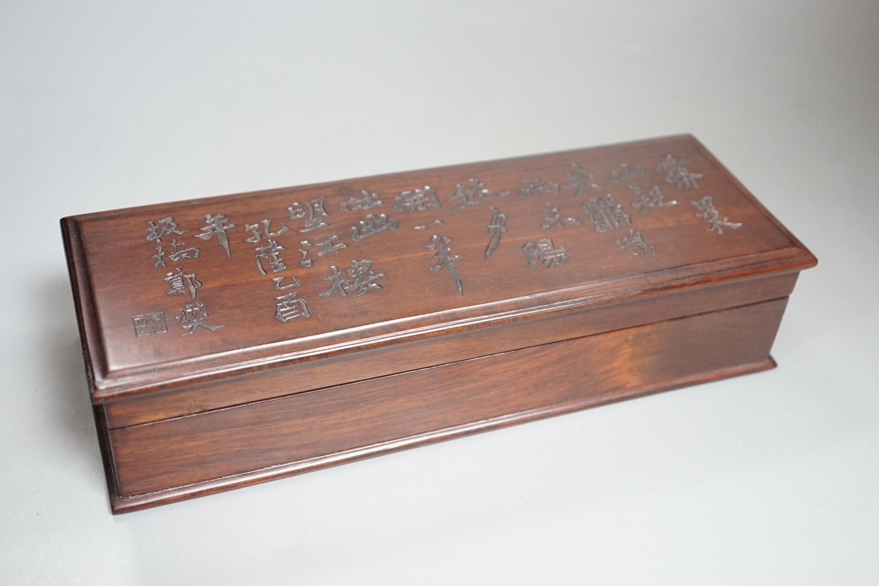 A Chinese hongmu box, inscribed with a Confucian poem, 28cms